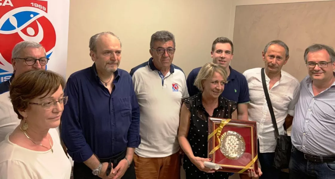 Un momento della premiazione: al cntro al signora Maria Terasa  con il figlio Luciano Franzini e il sindaco Marco Gallo