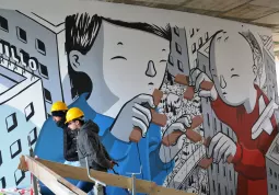 Il murales dell’artista Millo nell’atrio del polo scolastisco